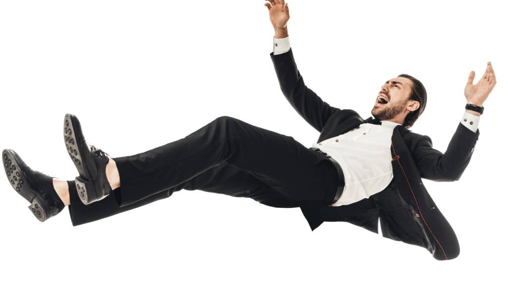 Homem caindo - Créditos: depositphotos.com / EdZbarzhyvetsky