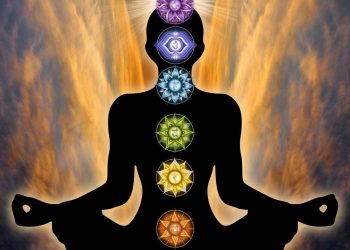 Silhueta de meditação e símbolos do zodíaco - Créditos: depositphotos.com / martesign